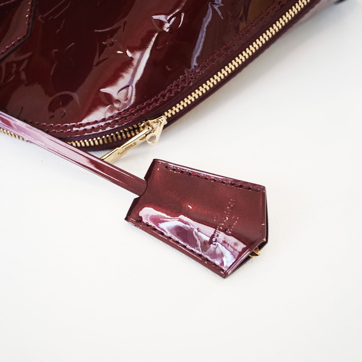 Louis Vuitton Almba BB - Monogram Vernis in Amarante