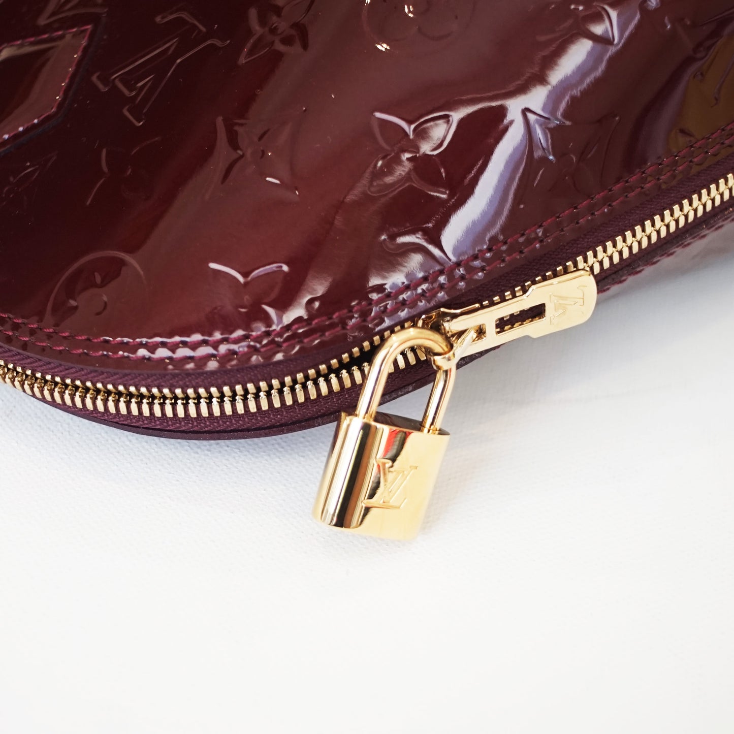 Louis Vuitton Almba BB - Monogram Vernis in Amarante