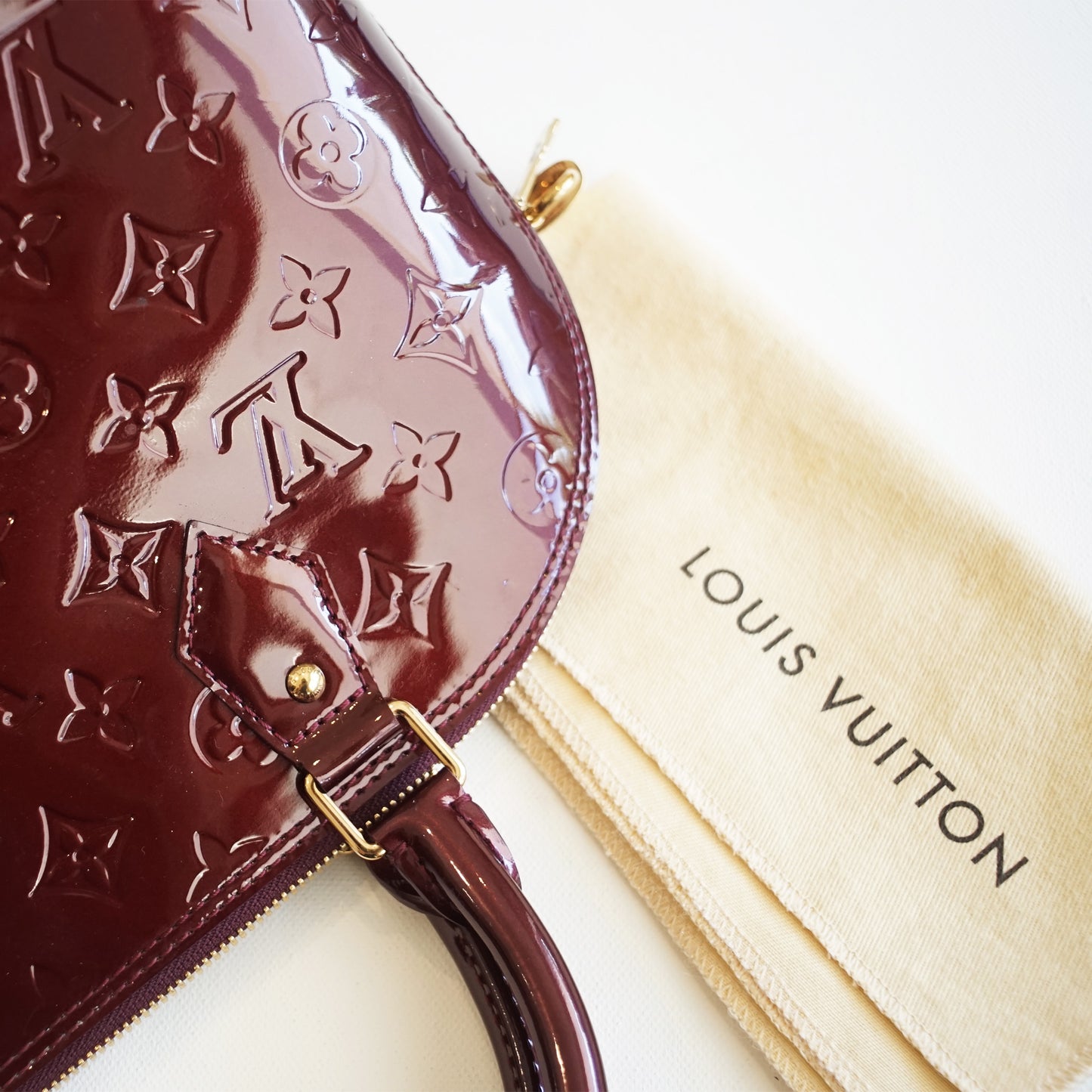 Louis Vuitton Almba BB - Monogram Vernis in Amarante